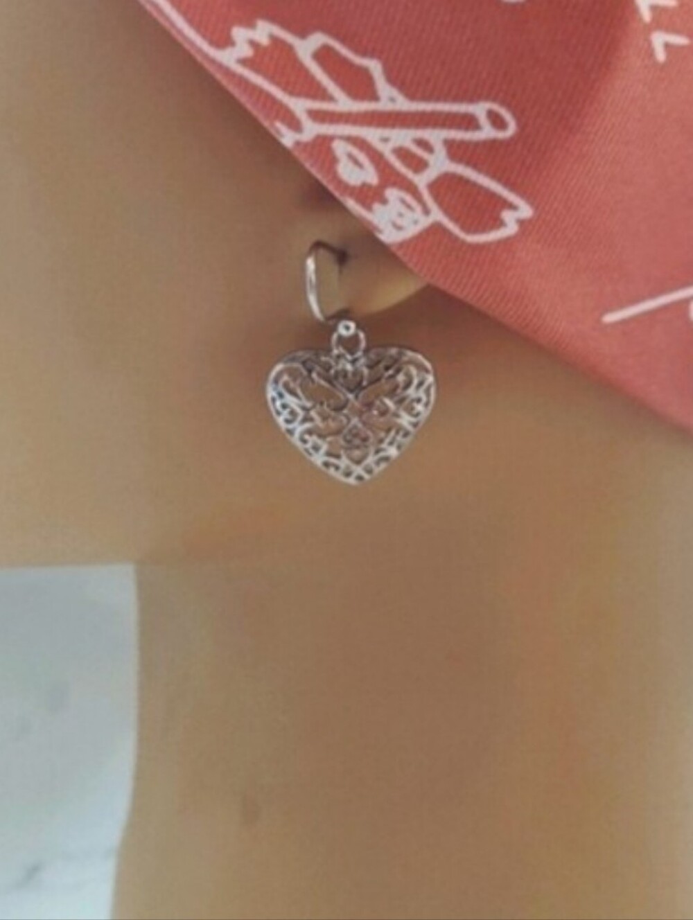 New platinum heart earrings.